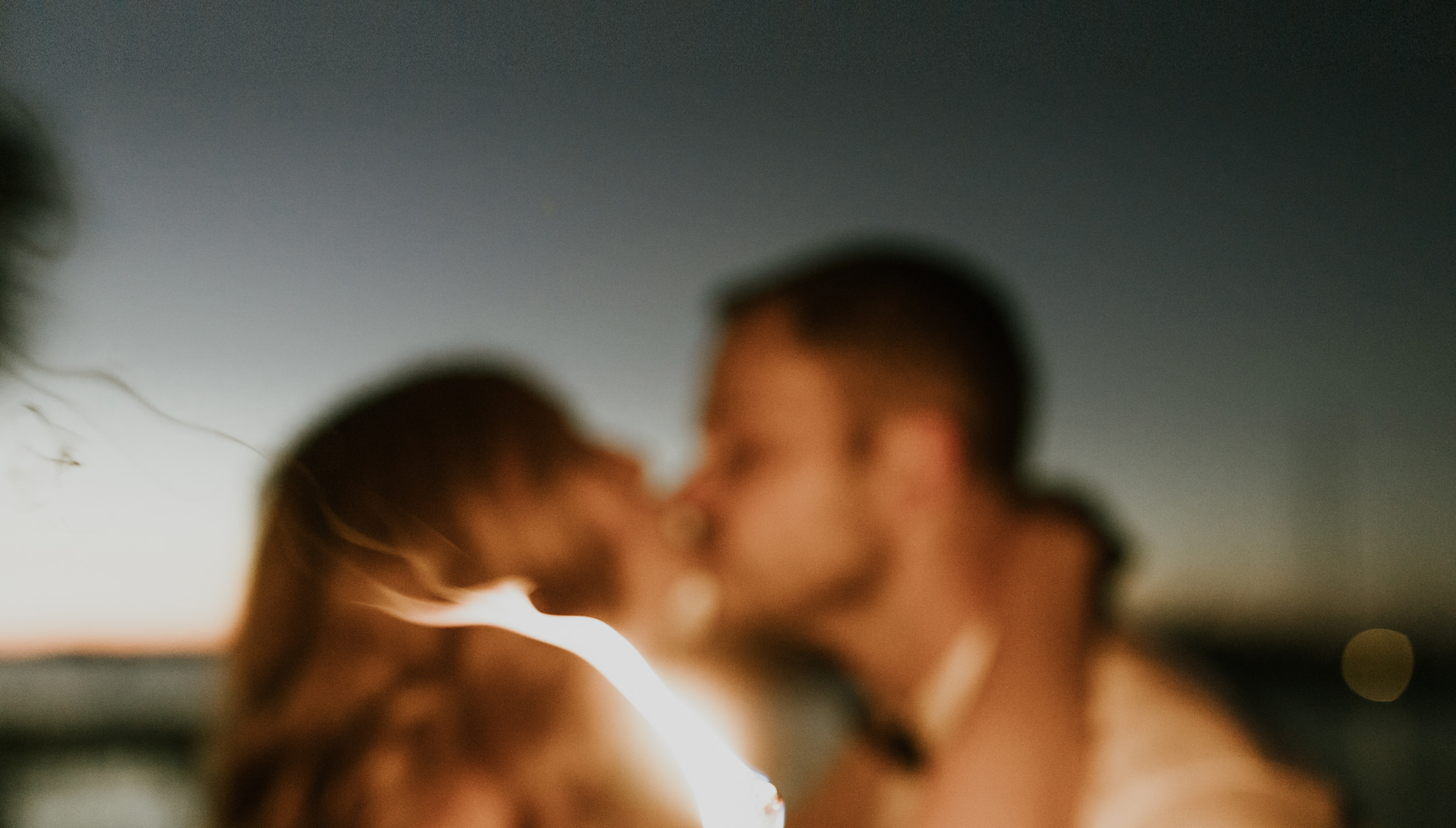 Creative wedding photography at night by traveling Elopement and Wedding Photographer, Katie Bertagnolli